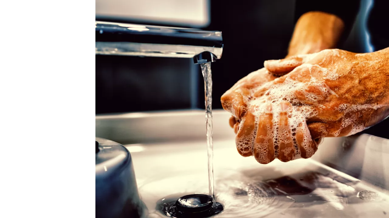 Image of someone washing their hands.