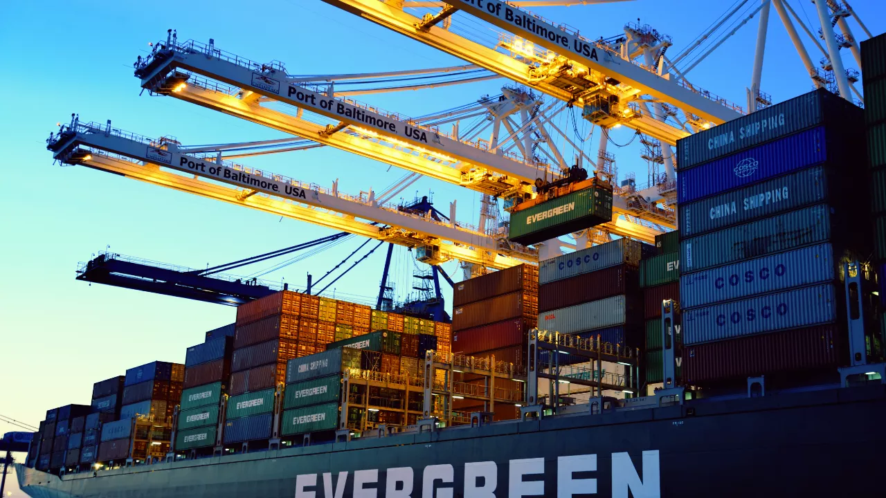Image of seaport with container and cranes.