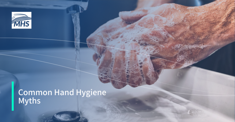 A person washing their hands with soap and water, with the words Common Hand Hygiene Myths