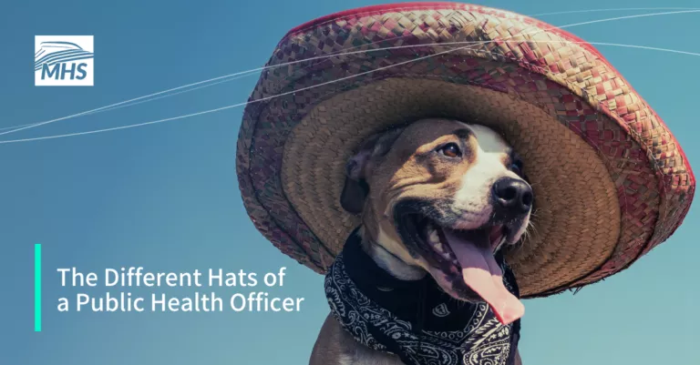 An image featuring a dog wearing a big hat, with the words, The Different Hats of a Public Health Officer