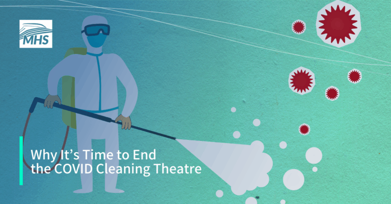 A cutout cardboard illustration of cleaner disinfecting viruses with the words, Why It’s Time to End the COVID Cleaning Theatre